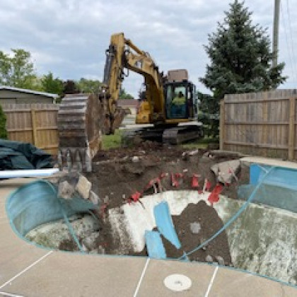 Hill Demolition project equipment at work